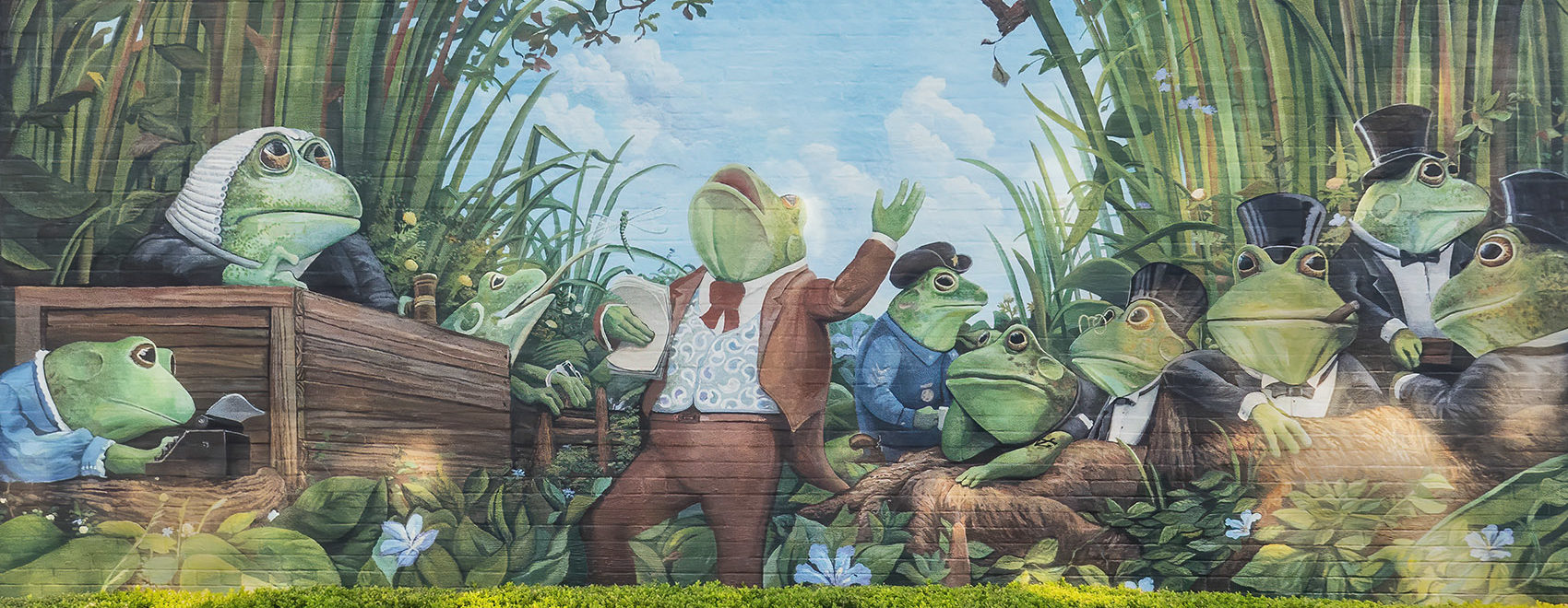 mural showing frogs everywhere in Rayne, Louisiana