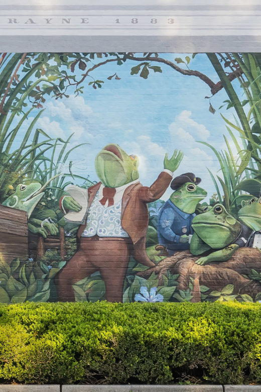 mural showing frogs everywhere in Rayne, Louisiana