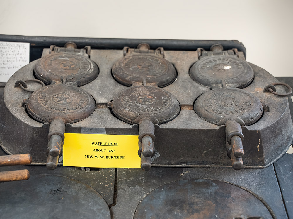 set of 6 antique waffle irons at Tensas Parish Museum in St. Joseph Louisiana