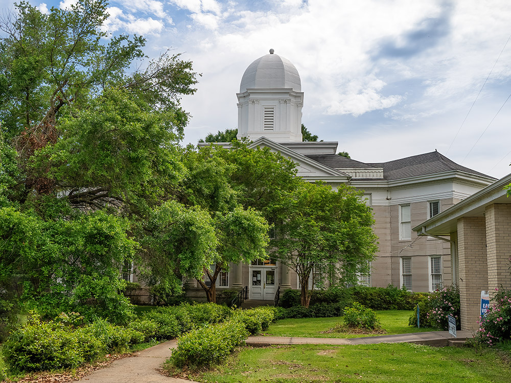 Tensas Parish courthouse with dome and trees in St. Joseph Louisiana