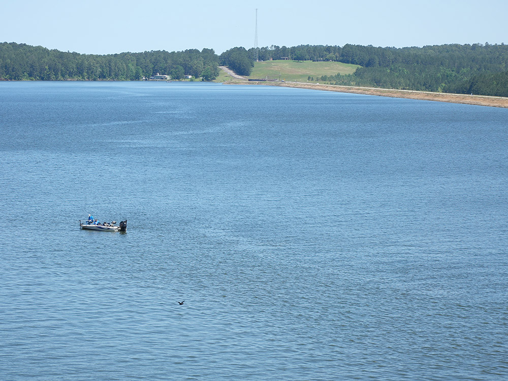 fishing boat on Toledo Bend Reservoir near the dam