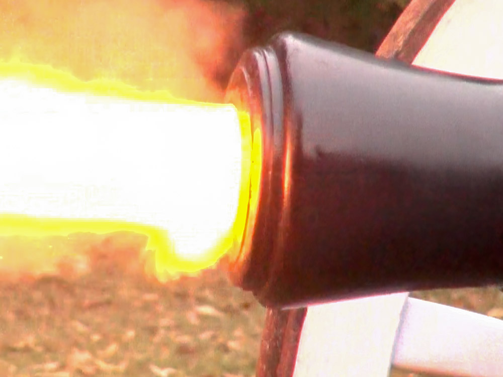 close up of flames shooting out of cannon barrel