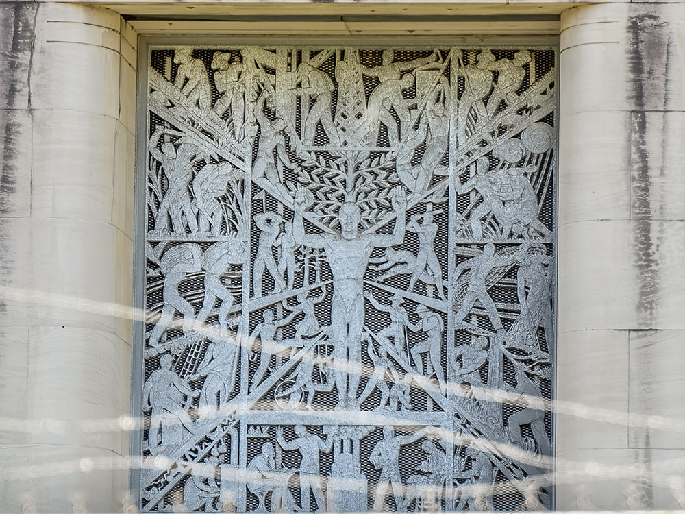 metal artwork above hospital entrance