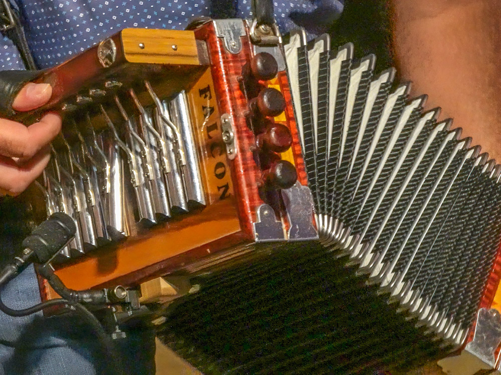 close up of accordion being played Fred's Lounge in Mamou Louisiana