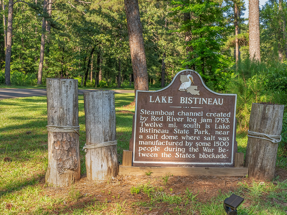 brown historical marker tells history of Lake Bistineau State Park