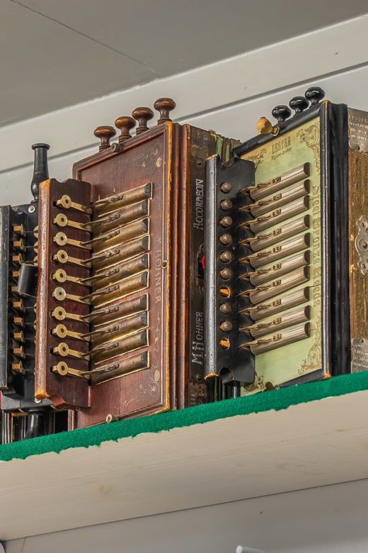 old cajun accordion on shelf