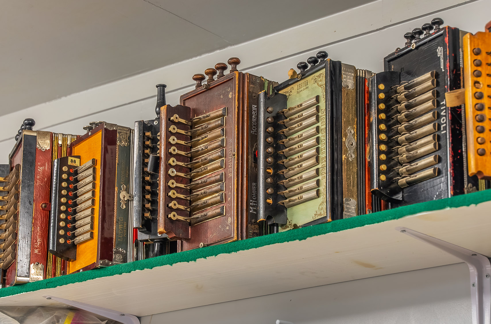 old cajun accordion on shelf