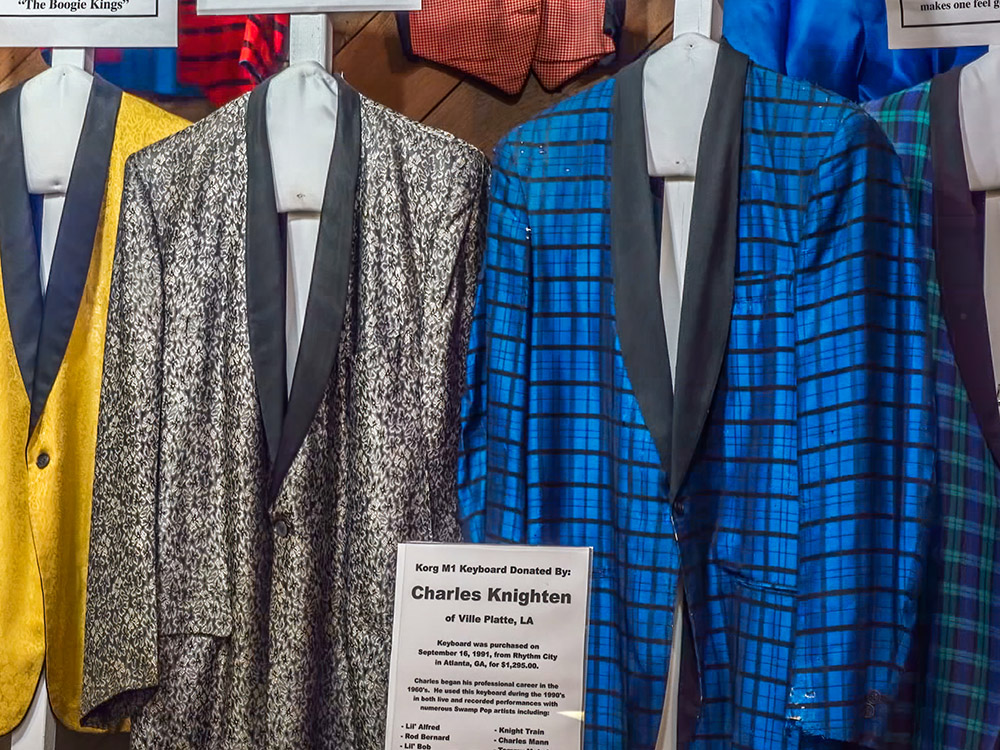 gold silver and blue tuxedos worn by swamp pop musicians