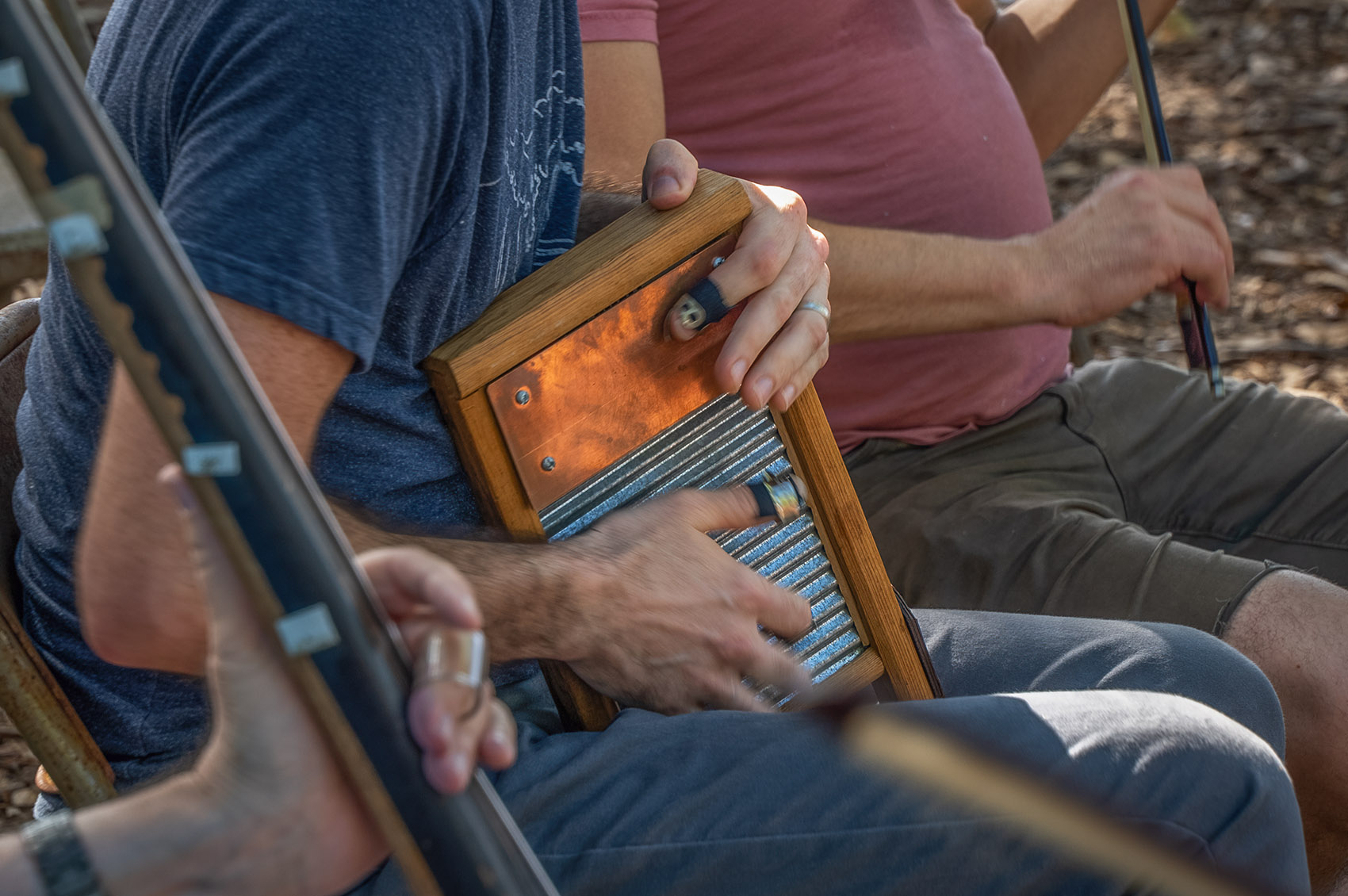 hands playing washboard in Cajun band