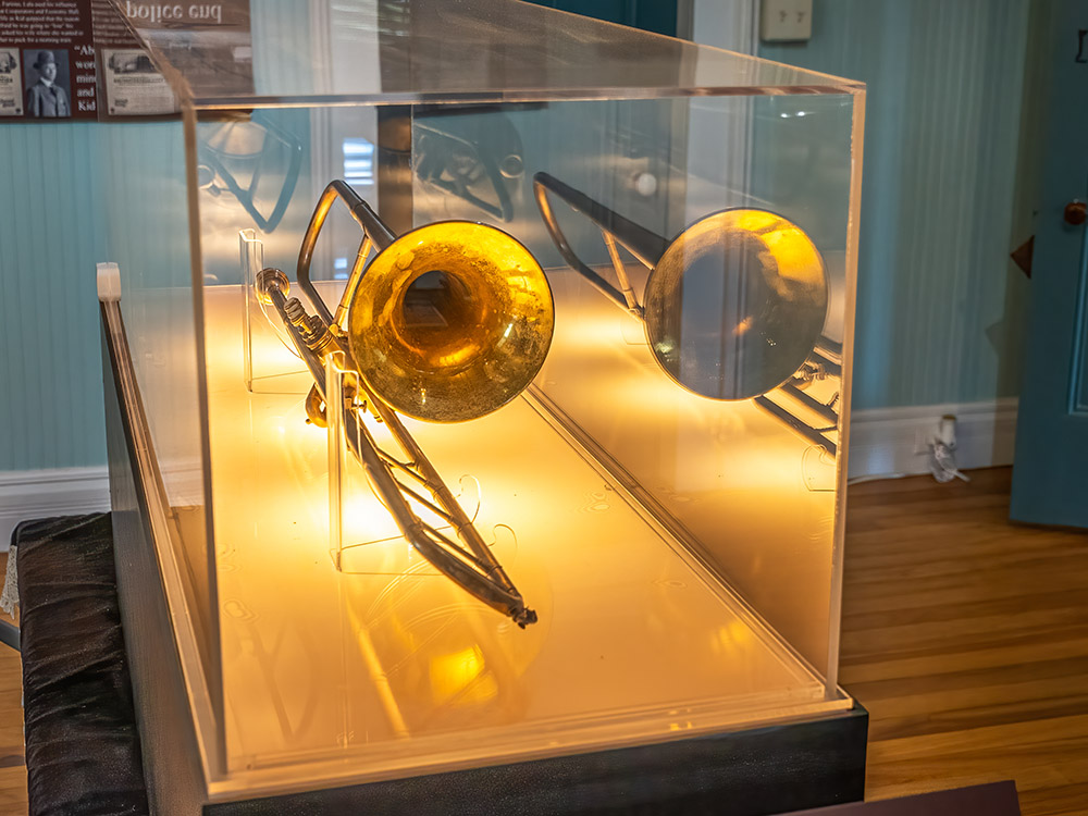 brass valve trombone in display case at 1811 kid ory house museum
