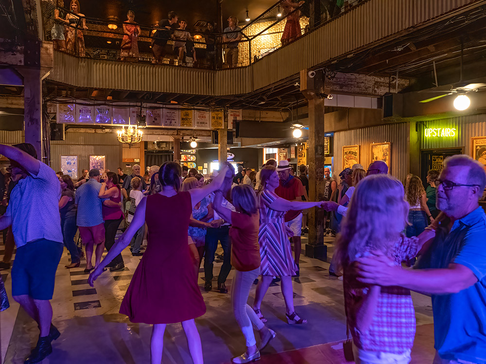 dancers spin and two-step at Tipitina's Fais-dodo