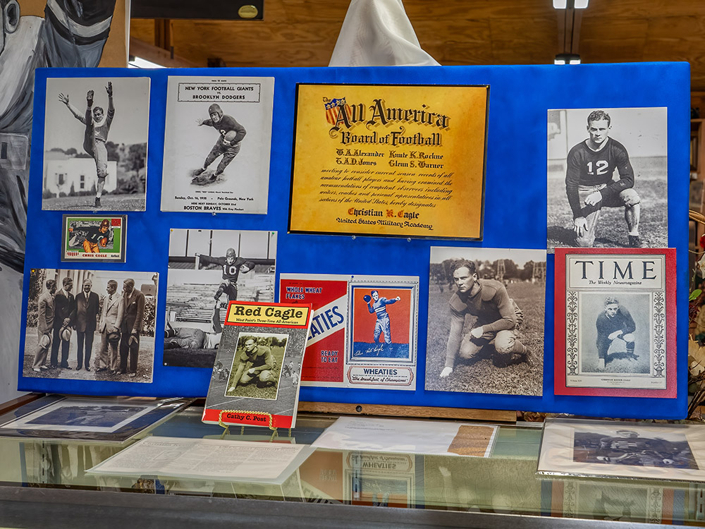 pictures in museum display of football player Red Cagle