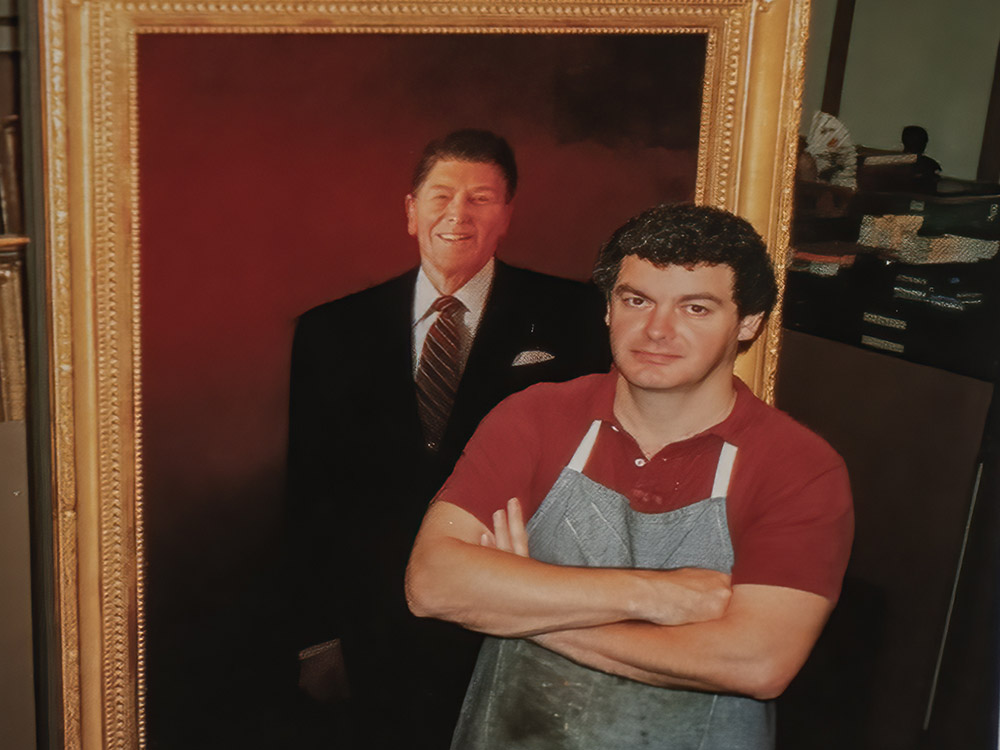 large portrait of President Ronald Reagan with artist Henry Casselli