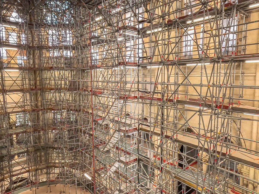 tall scaffolding inside nave of Notre Dame