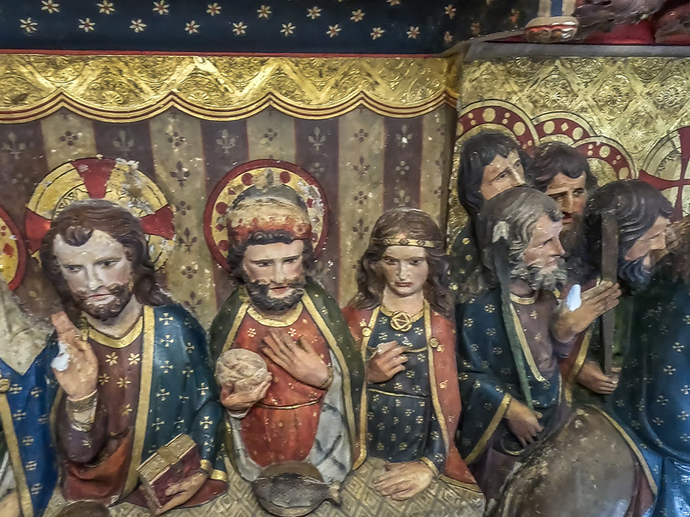 damaged sculptures in the choir loft of Notre Dame