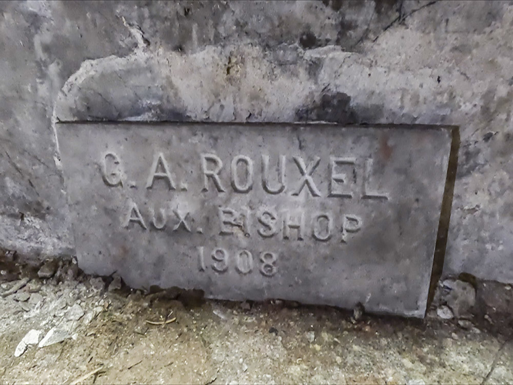 burial plaque of bishop from 1908 in underground vault