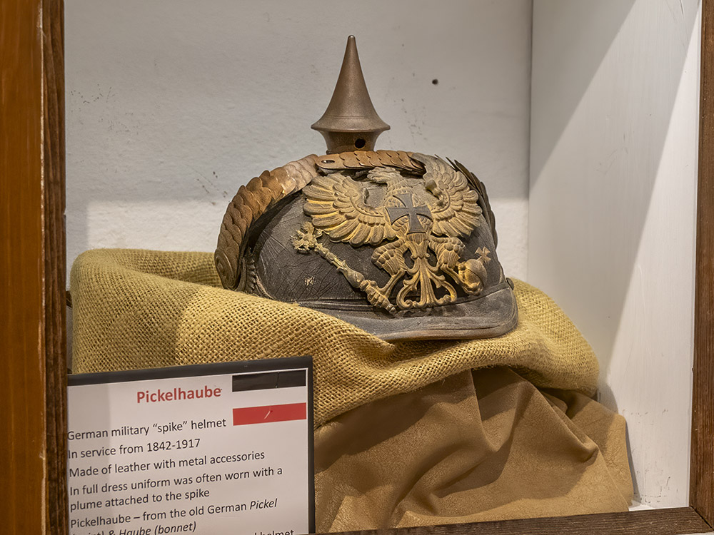 spiked German military helmet on display in museum