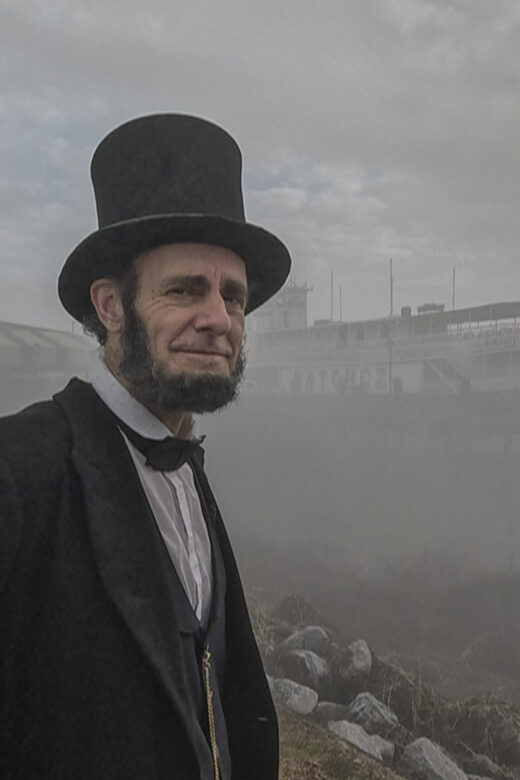 Abraham Lincoln Look alike on foggy riverfront in New Orleans