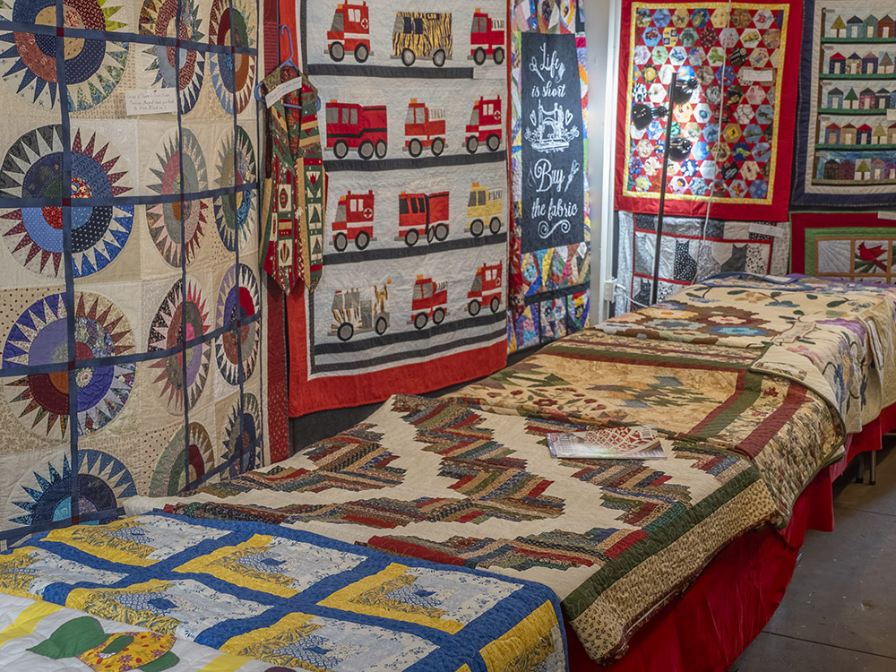 a variety of quilts on display