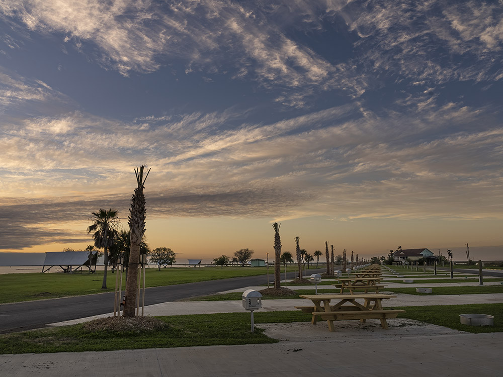 sunset and rv camping area at cypremort point