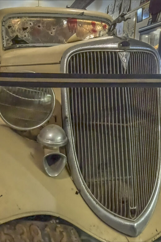 front grill of yellow antique car