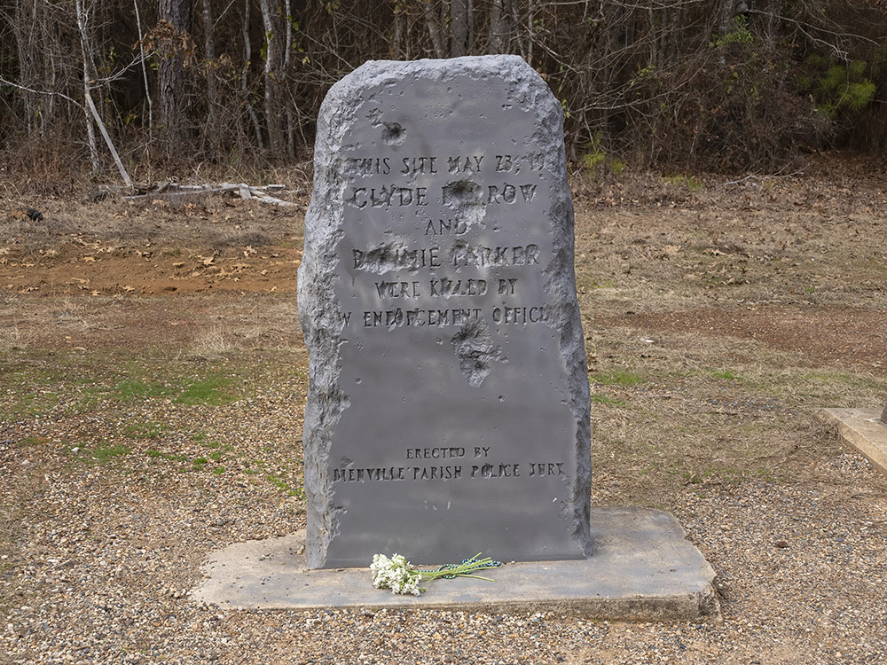 gray stone marker to death location of Bonnie Parker and Clyde Barrow