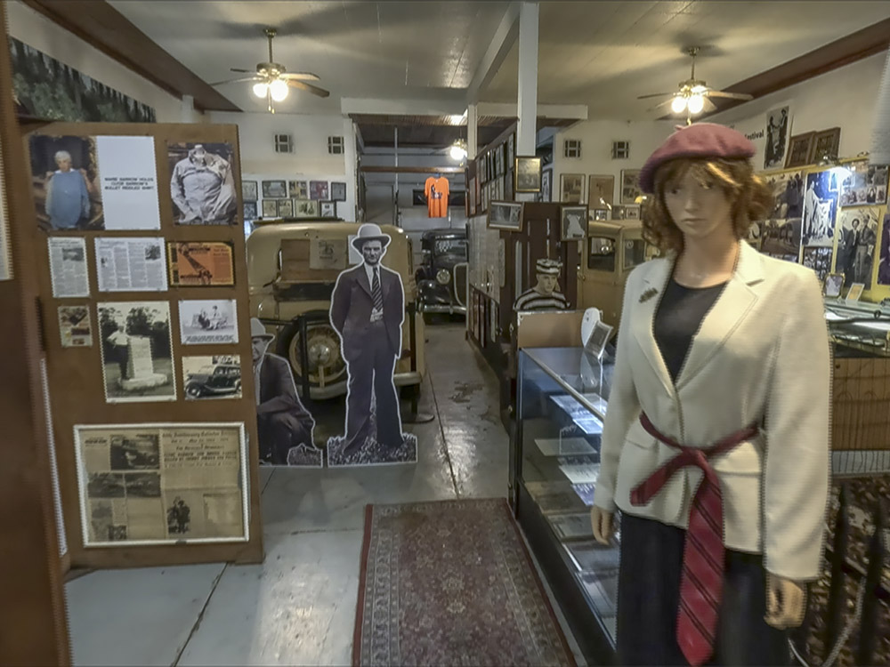 interior of museum with female mannequine and other displays