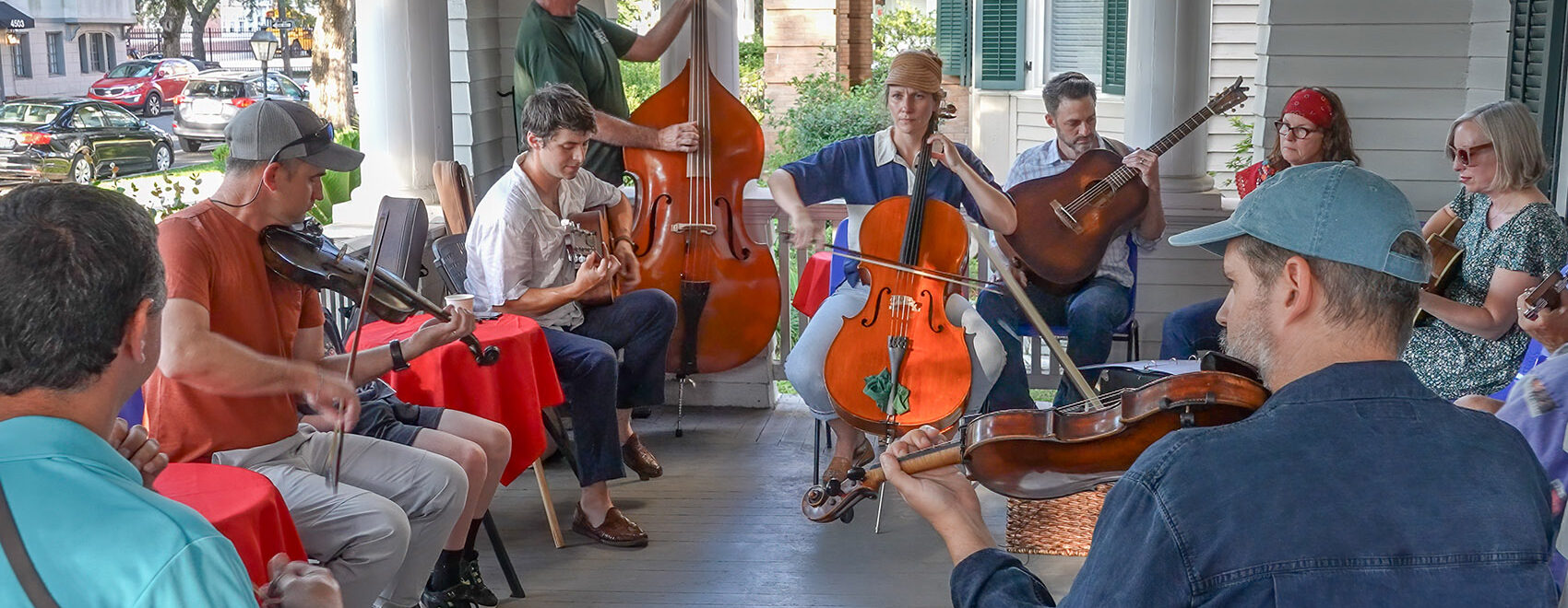 musicians playing Cajun music on front porch of New Orleans home