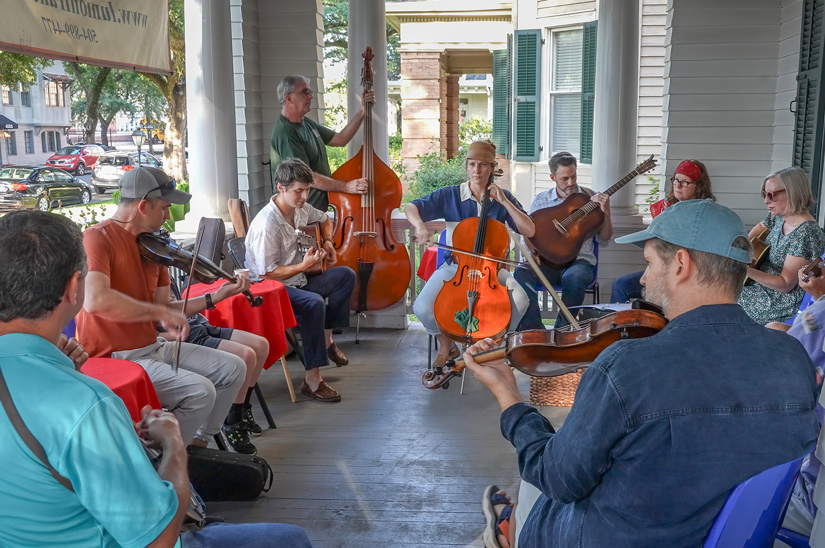 musicians playing Cajun music on front porch of New Orleans home