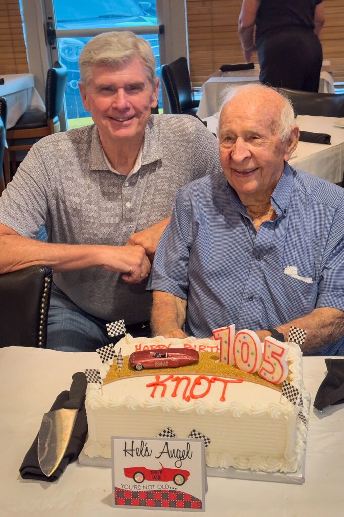 knot 105 birthday  cake with two men