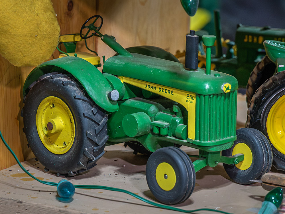 green and yellow toy john deere tractor