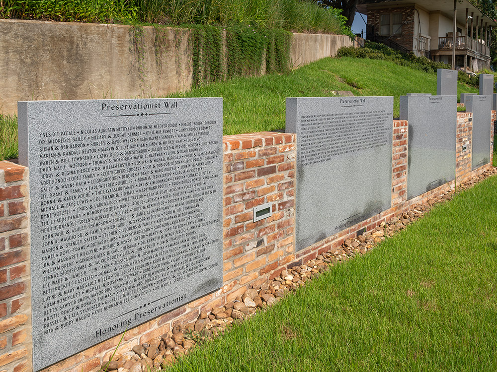 granite and brick wall with names