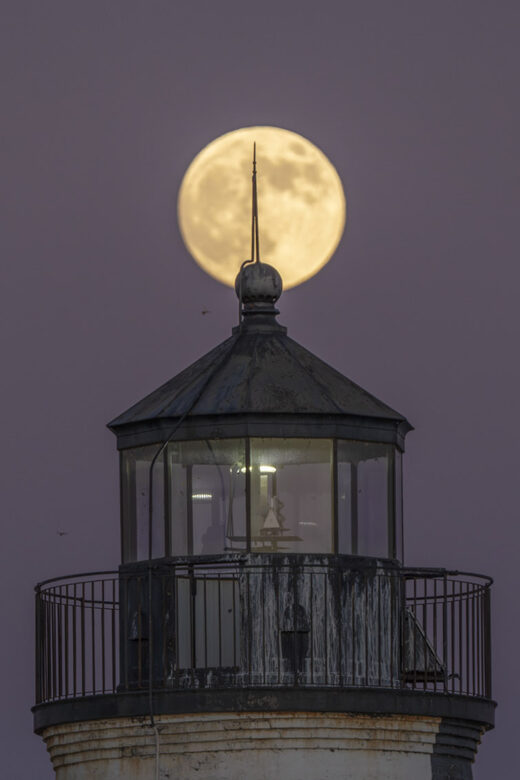 supermoon and lighthouse