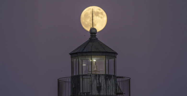 supermoon and lighthouse