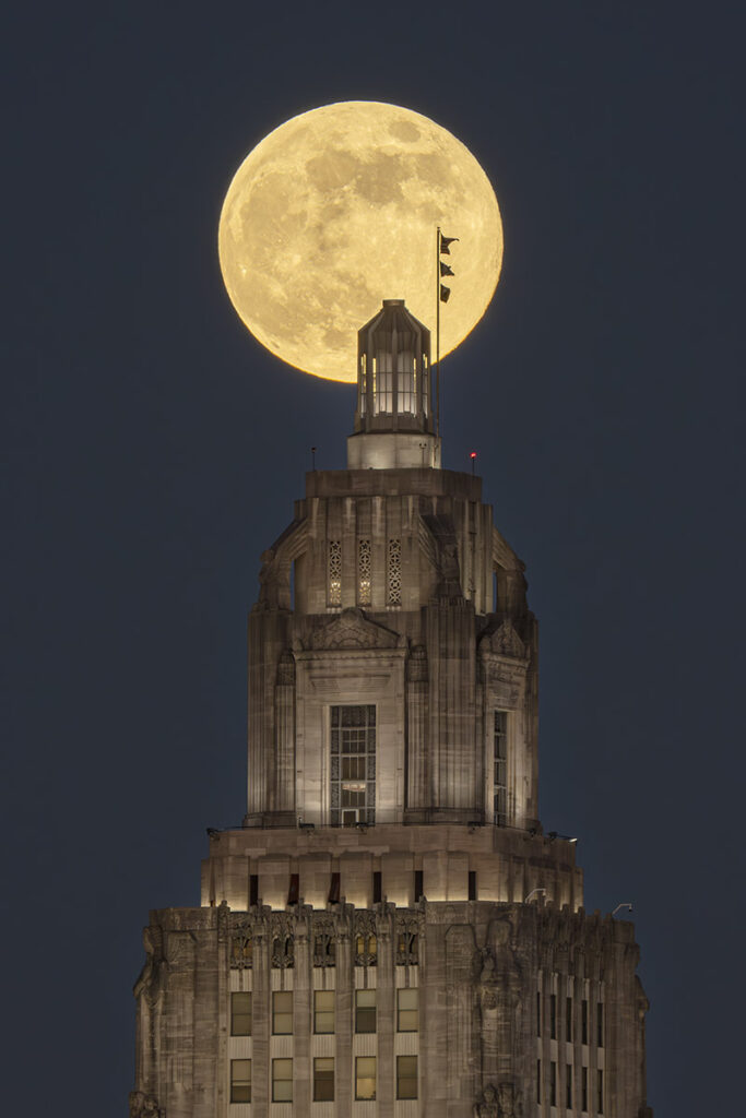 supermoon behind the top of the Louisiana state capitol