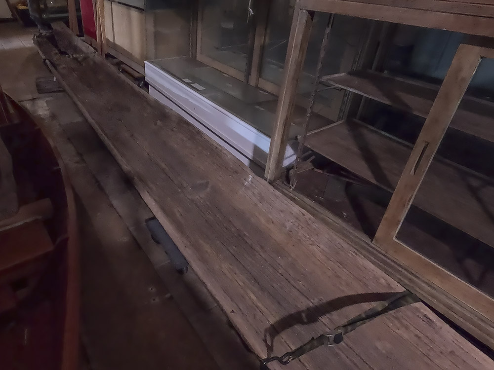 wood native dugout canoe in storage  