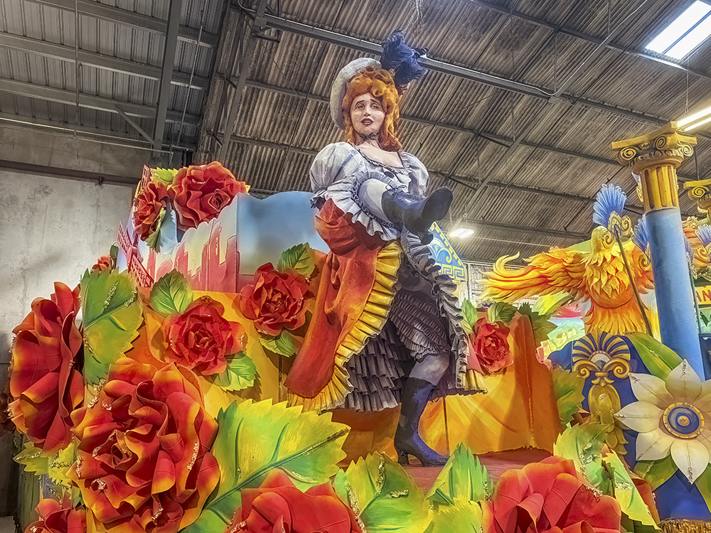 colorful float with can can dancer and flowers