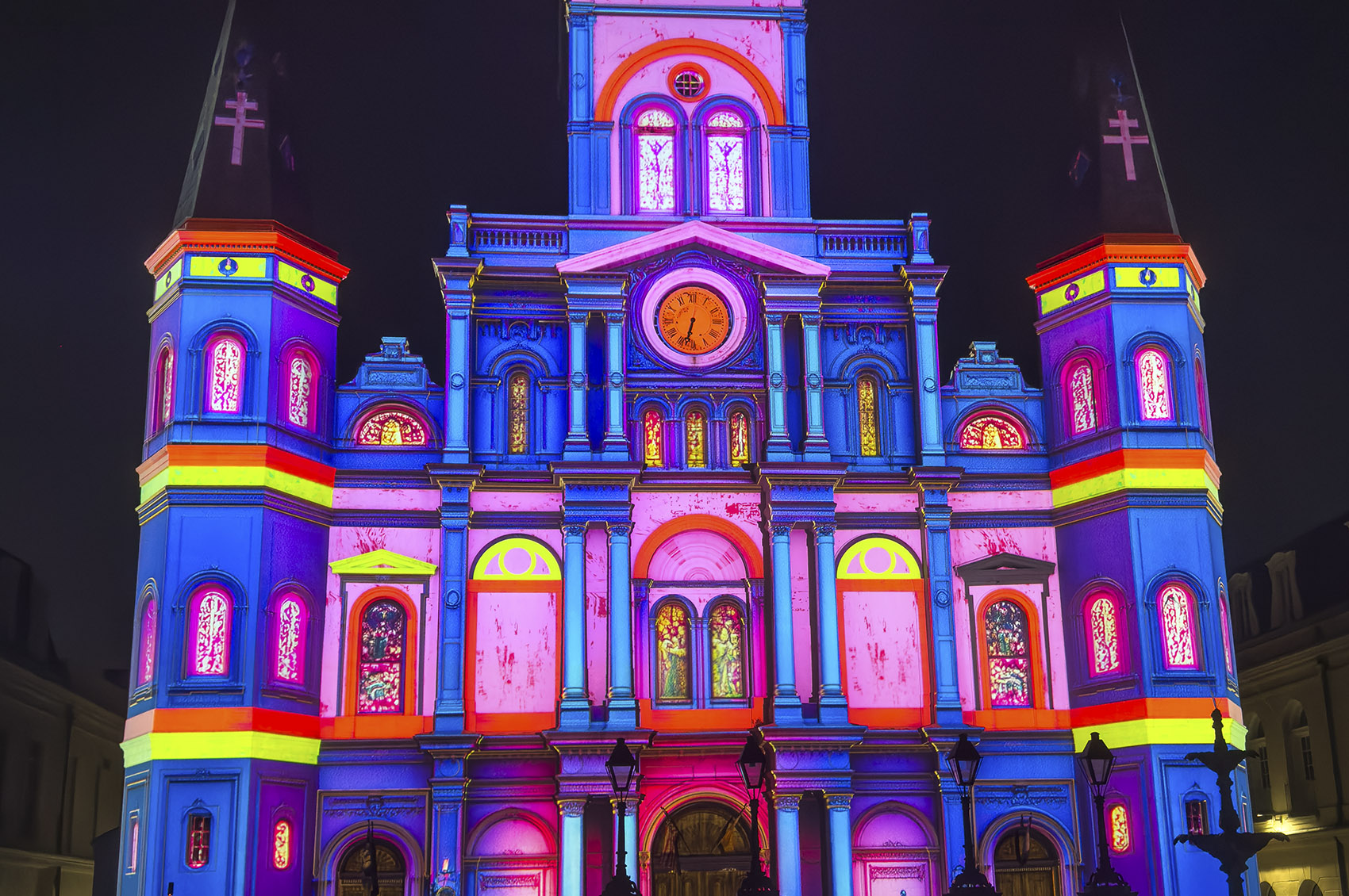 colorful light show projected on cathedral