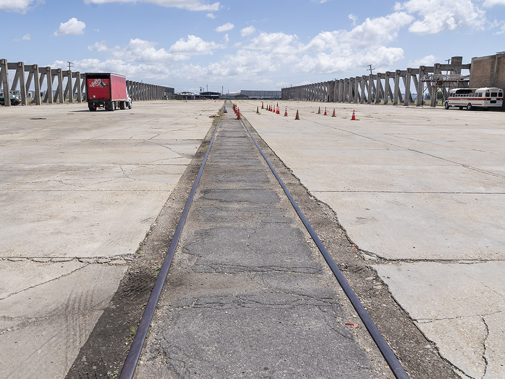 large concrete foundation with pylons on either side