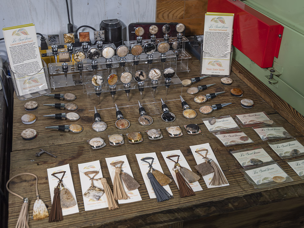 bottle stoppers, bookmarks and guitar picks made with polished gemstones
