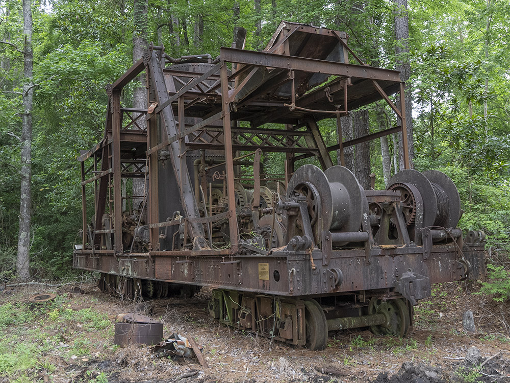 rested lumber skidder on rails