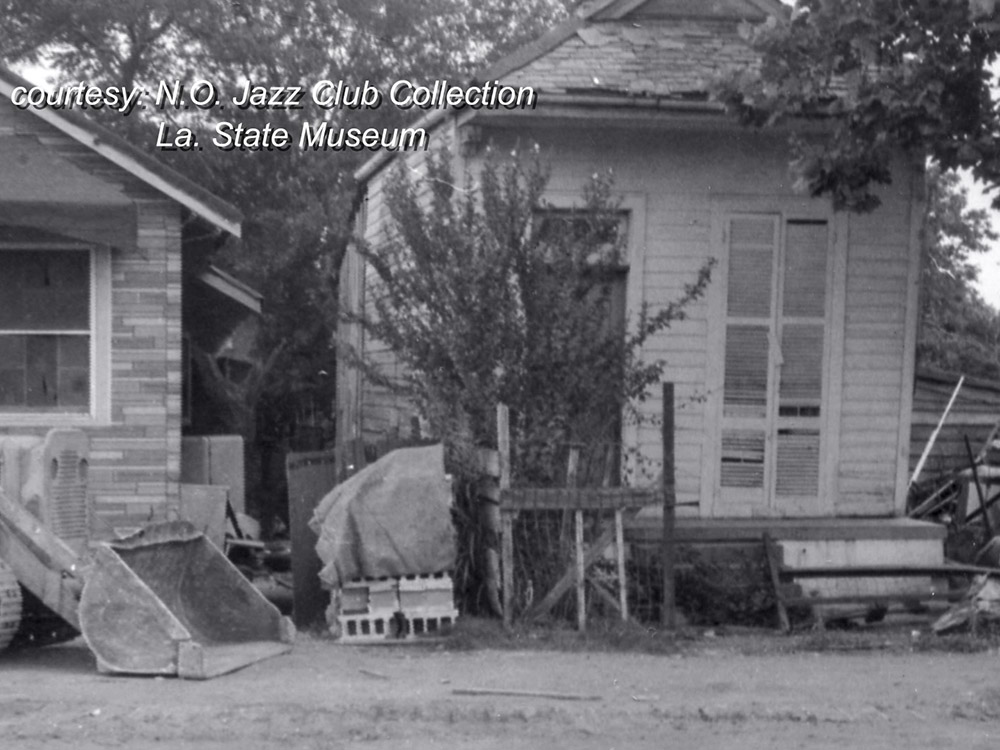black and white photo of old woodframed house