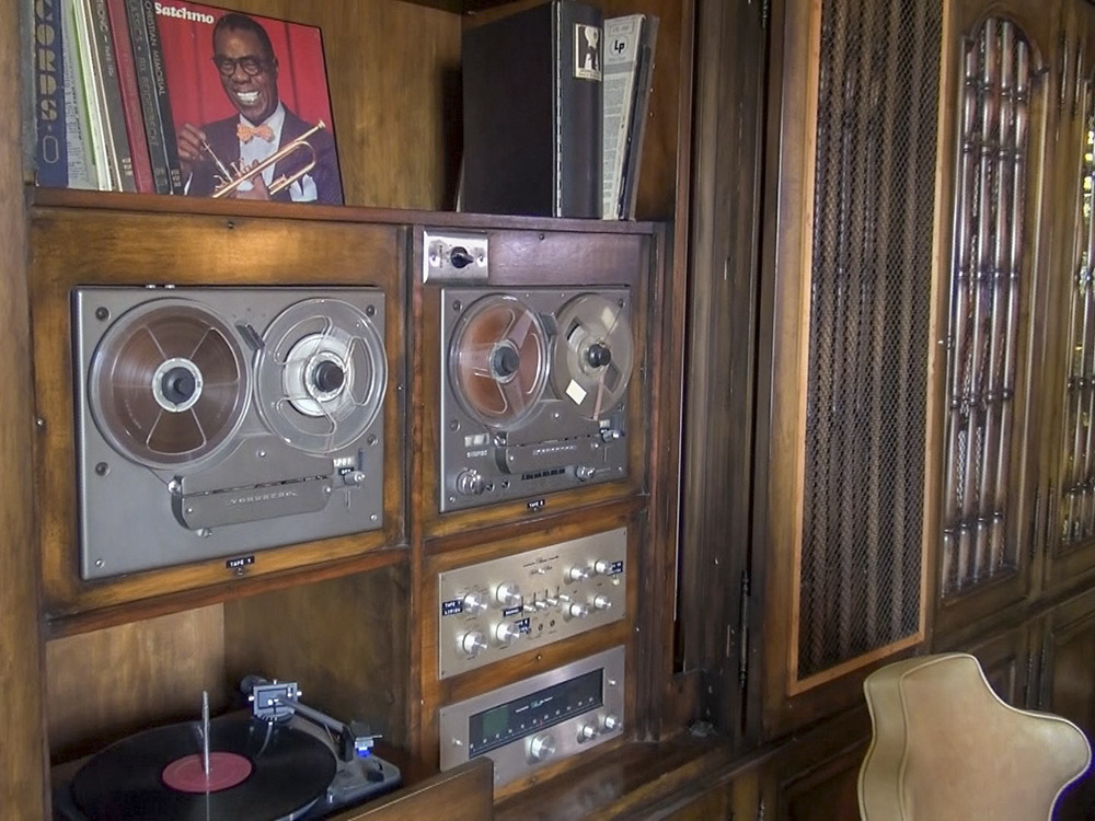 reel to reel tape recorders and audio equipment in home office