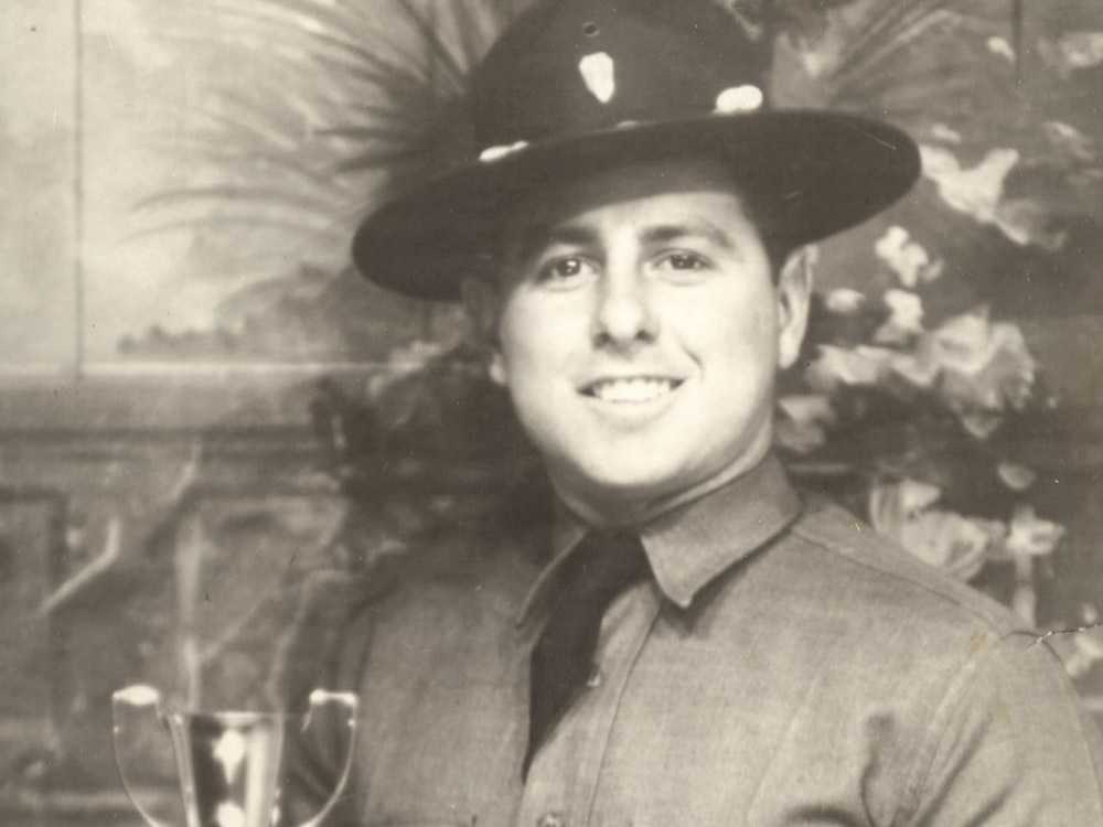 black and white photo of American paratrooper in uniform