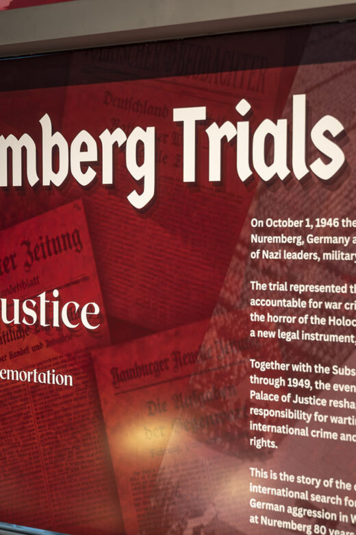 red display sign reading The Nuremberg Trials - search for justice