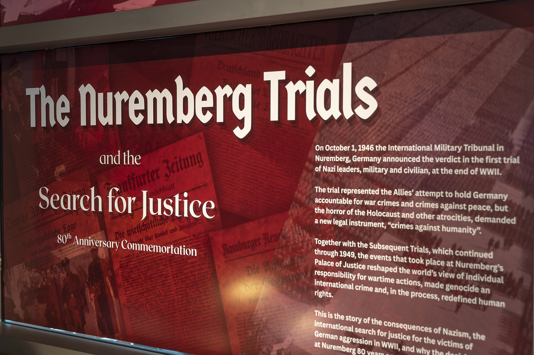 red display sign reading The Nuremberg Trials - search for justice