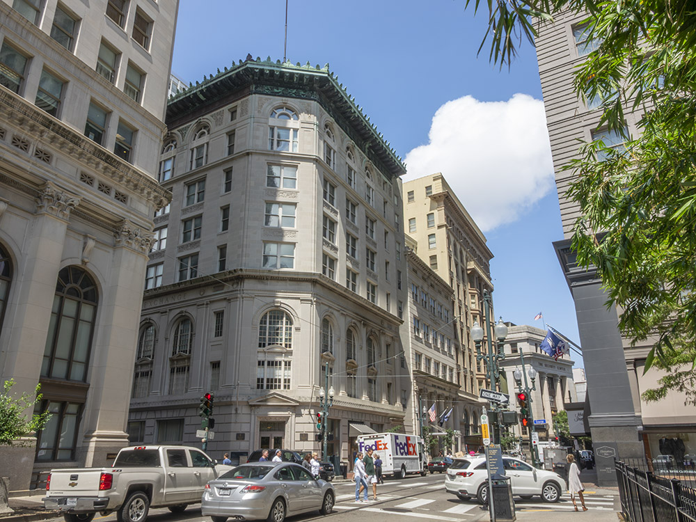 historicdowntown buildings at street corner in New Orleans