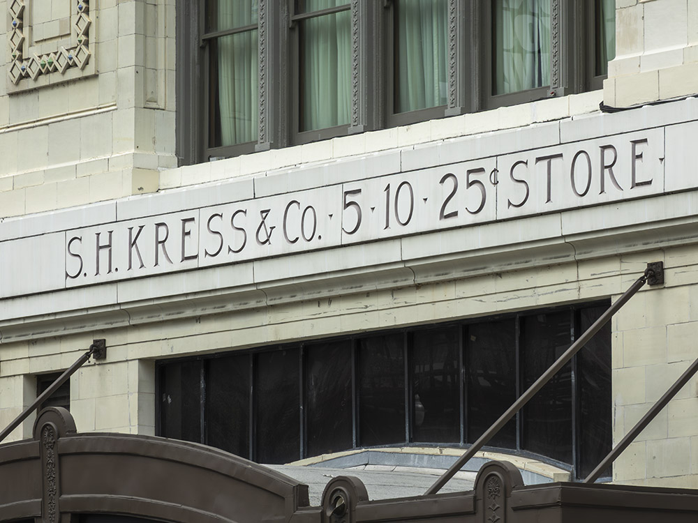 sign on building for Kress 5-10-25 cent store