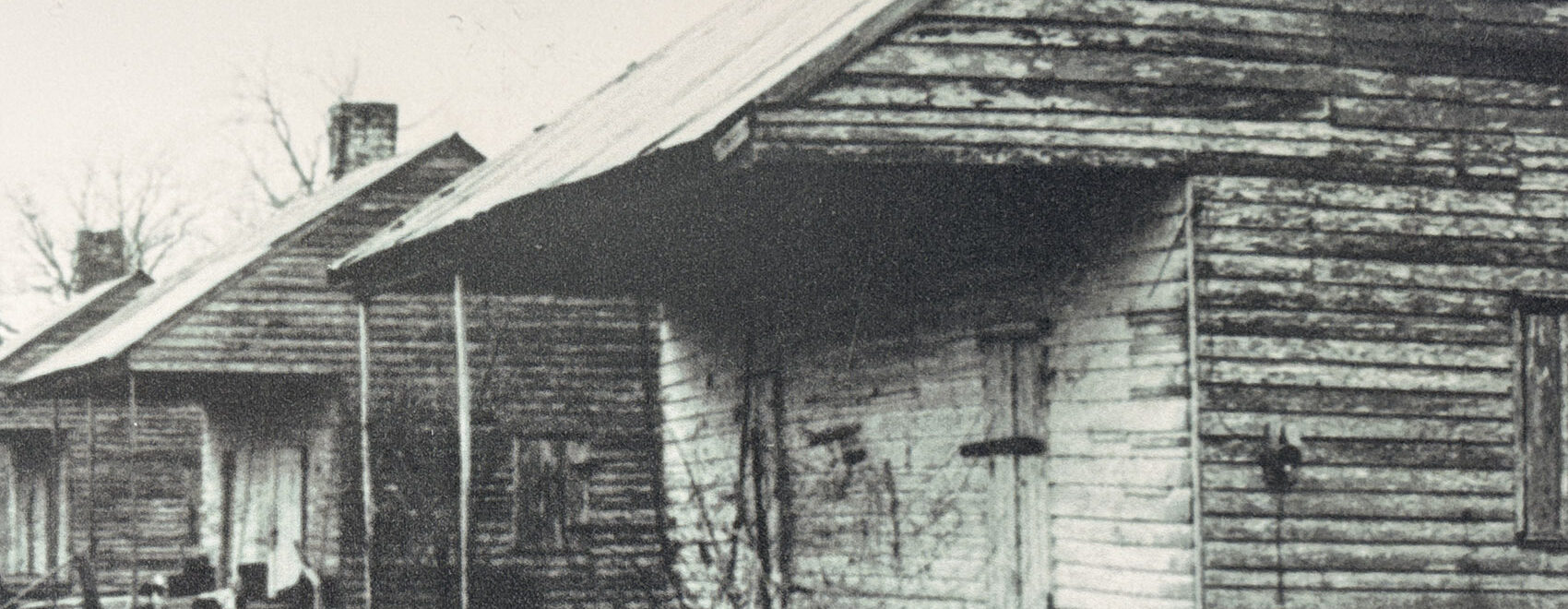 black and white photograph of old quarters houses