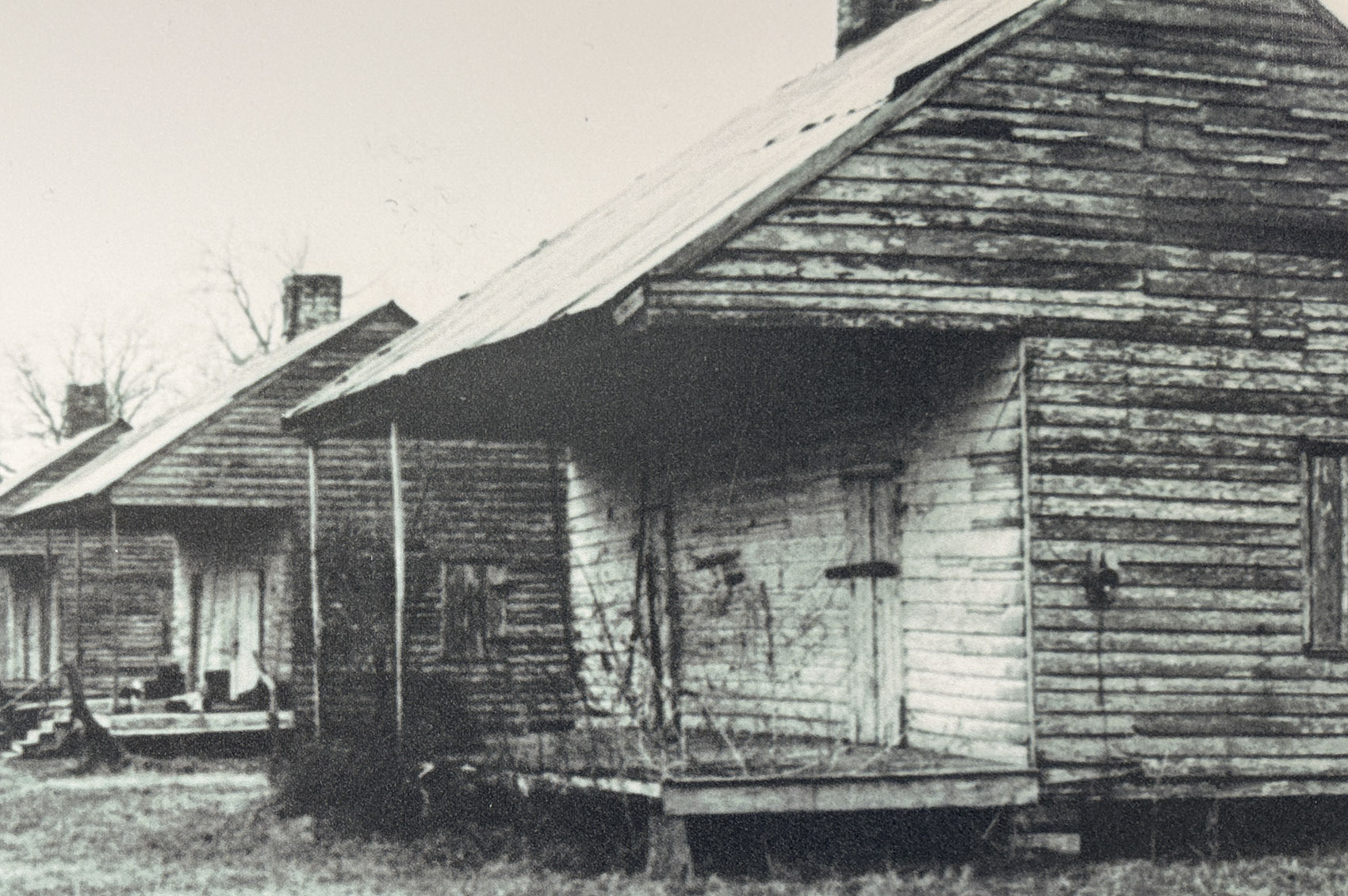 black and white photograph of old quarters houses